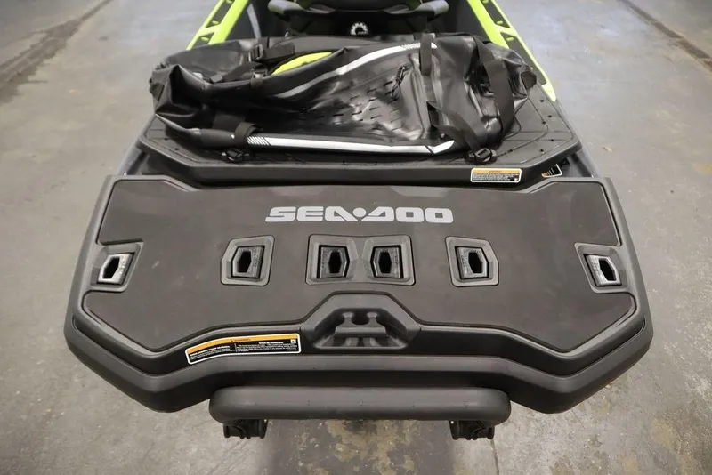 Slide: The Image of 2026 Sea-Doo Explorer Pro 170 rear deck with storage and logo. - 23