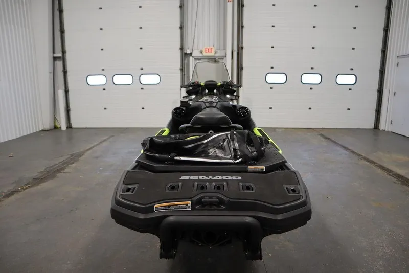 Slide: The Image of 2026 Sea-Doo Explorer Pro 170 jet ski in a garage setting. - 9