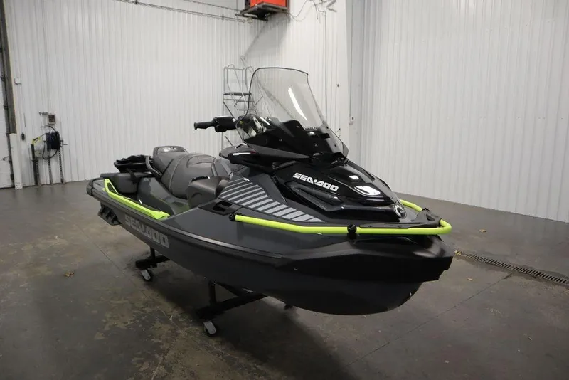 Slide: The Image of 2026 Sea-Doo Explorer Pro 170 jet ski in a garage setting. - 5