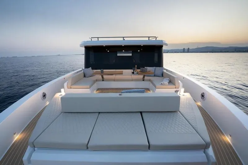 Slide: The Image of Luxury De Antonio D60 yacht, 2026, at sunset on the sea. - 7