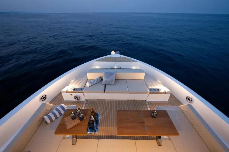 Slide: The Image of Luxurious deck of De Antonio Yachts D60, 2026, at sunset. - 10