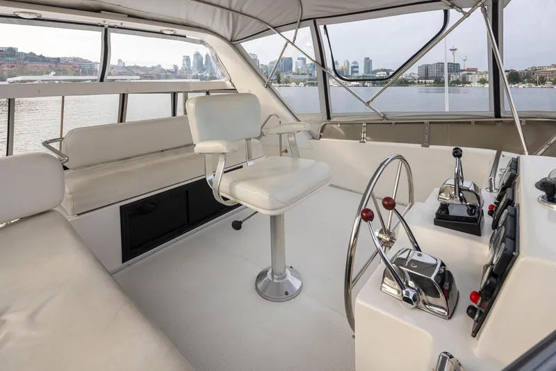 Slide: The Image of 1991 Ocean Alexander 440 Sundeck CPMY cockpit with city view. - 19