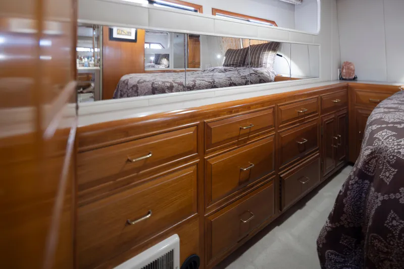 Slide: The Image of Interior of 1991 Ocean Alexander 440 Sundeck CPMY with wooden cabinetry. - 35