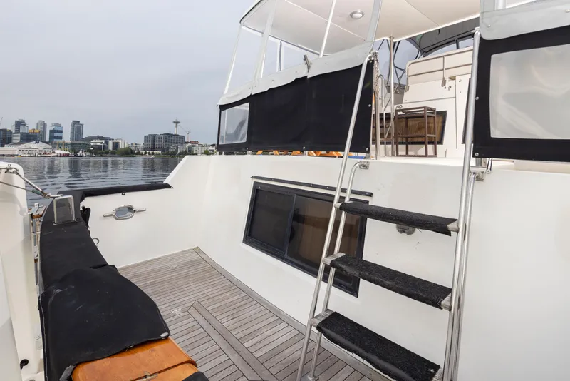 Slide: The Image of 1991 Ocean Alexander 440 Sundeck CPMY with deck and stairs. - 7