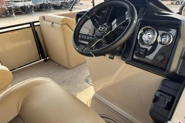 Slide: The Image of Interior of 2026 Veranda VR235F2 boat with steering wheel and dashboard controls. - 7