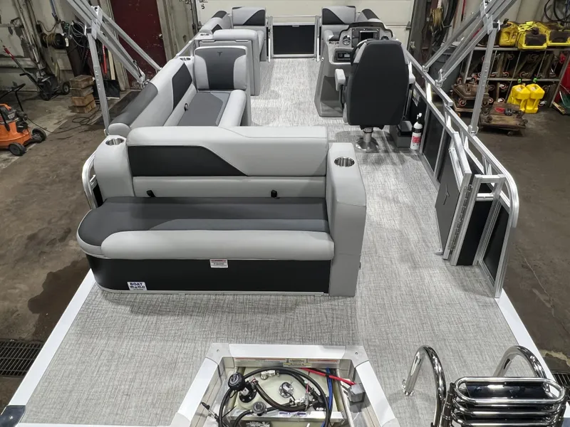 Slide: The Image of Interior of 2026 Tahoe Sport 1985 Cruise boat with gray seating. - 27