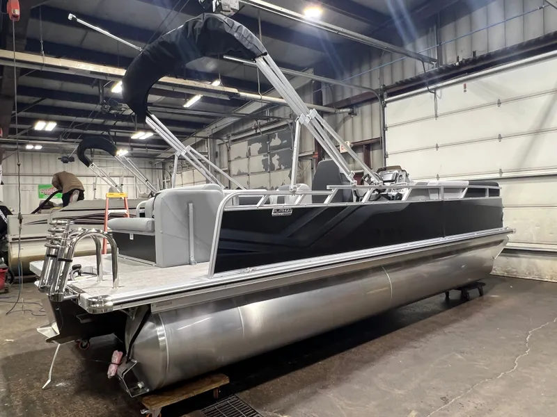 Slide: The Image of 2026 Tahoe Sport 1985 Cruise pontoon boat in workshop. - 30