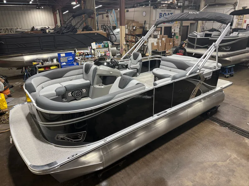The Image of 2026 Tahoe LTZ Pontoon with Honda 4-Stroke EFI indoors. - 1