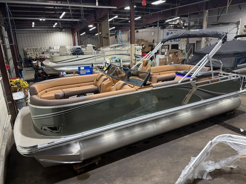 The Image of 2026 Tahoe LTZ 2385 Tritoon indoors, luxurious design. - 1