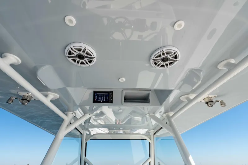Slide: The Image of 2023 Yellowfin 42 Offshore boat interior with speakers and control panel. - 32
