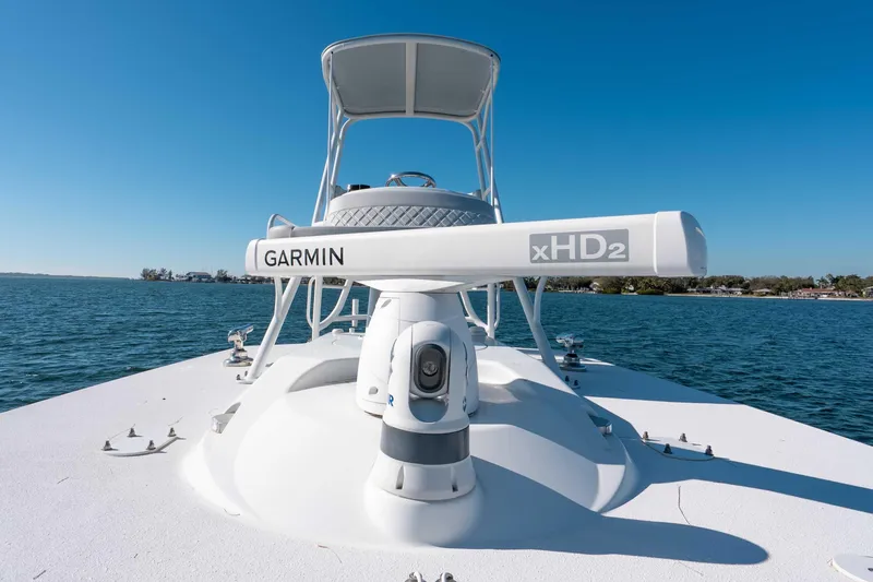 Slide: The Image of 2023 Yellowfin 42 Offshore boat with Garmin xHD2 radar on open water. - 45