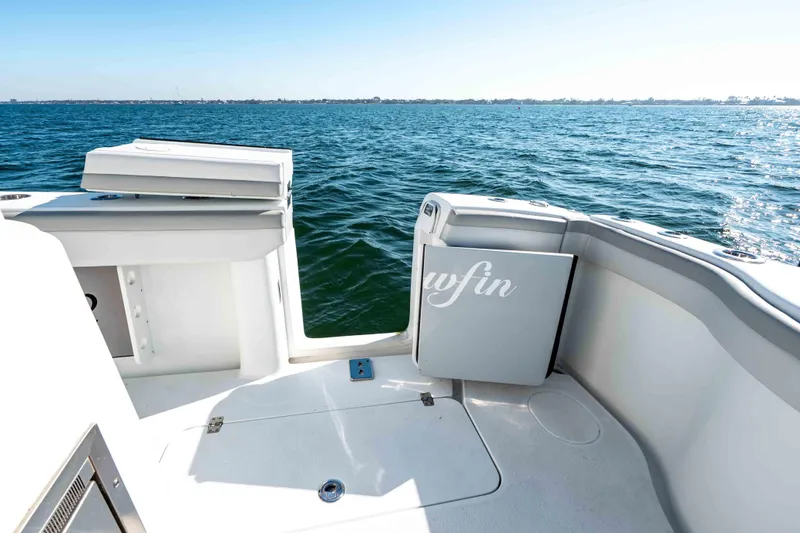 Slide: The Image of 2023 Yellowfin 42 Offshore boat deck with ocean view, featuring sleek design and spacious layout. - 47