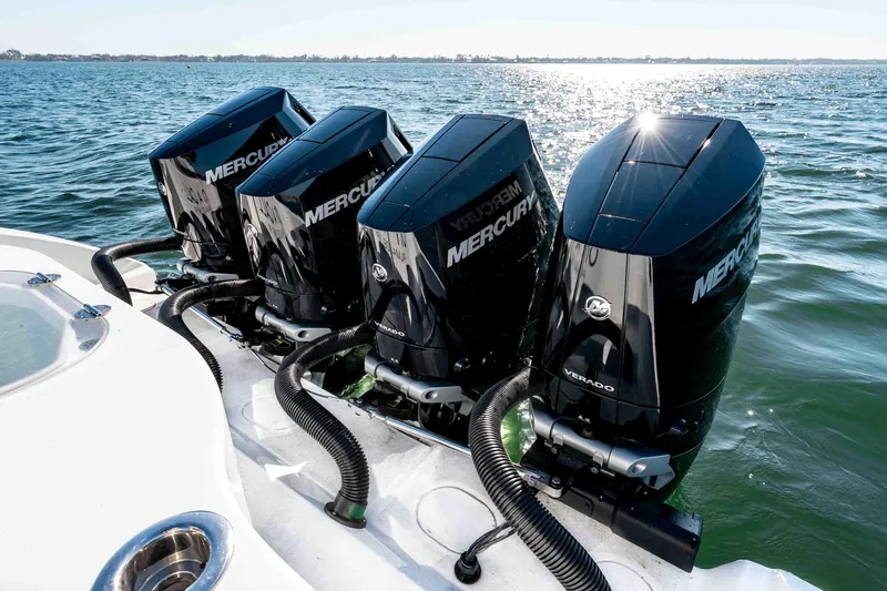 Slide: The Image of 2023 Yellowfin 42 Offshore boat with four powerful Mercury Verado outboard engines on water. - 48