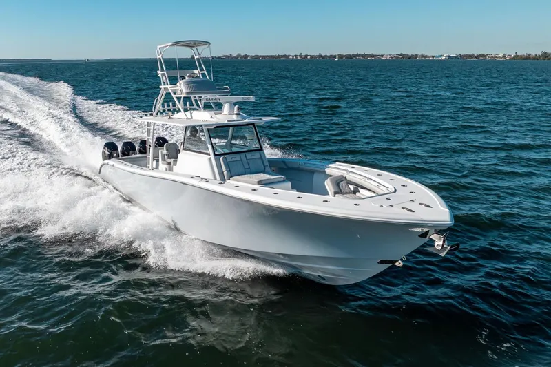 Slide: The Image of 2023 Yellowfin 42 Offshore boat cruising on open water. - 5