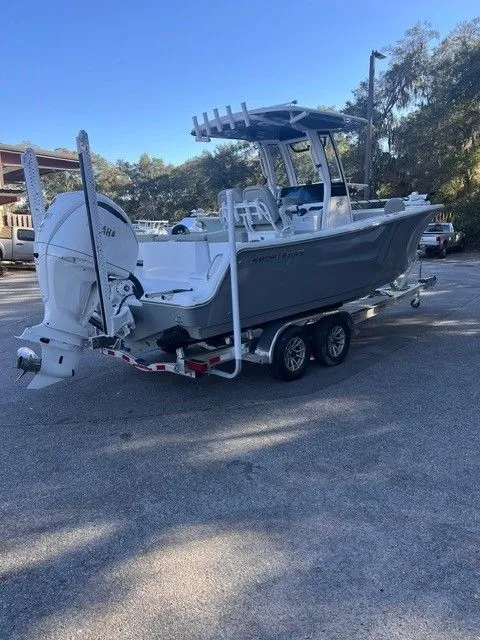The Image of 2025 Sportsman Heritage 231 Center Console on trailer, side view. - 1