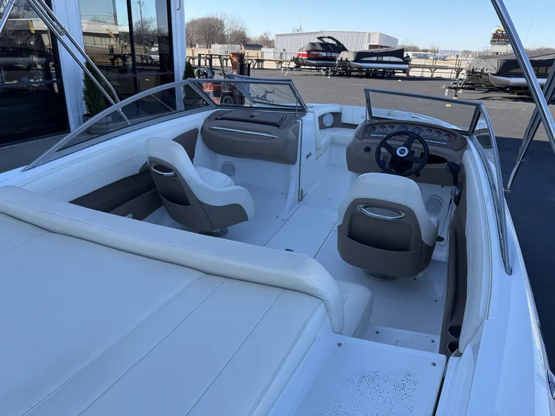 Slide: The Image of Interior of a 2008 Cobalt 202 boat with white seating. - 12