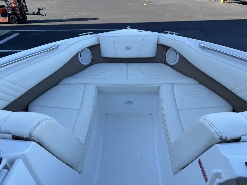 Slide: The Image of Interior of a 2008 Cobalt 202 boat with white upholstery. - 19