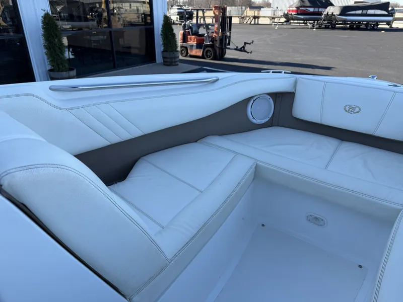 Slide: The Image of Interior of a 2008 Cobalt 202 boat with white seating. - 20