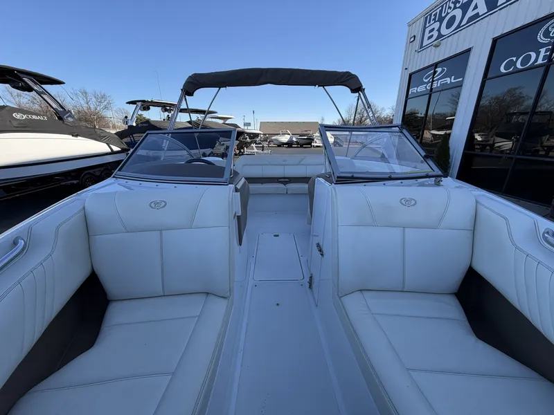 Slide: The Image of Interior view of a 2008 Cobalt 202 boat at a dealership. - 22