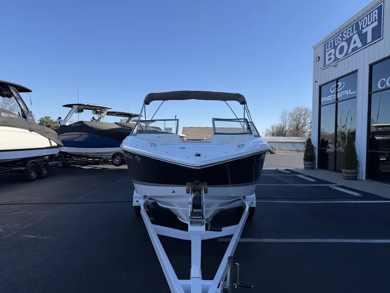 Slide: The Image of 2008 Cobalt 202 boat on a trailer in front of a sales building. - 3
