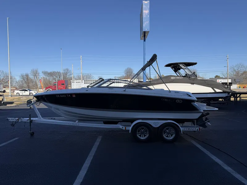 Slide: The Image of 2008 Cobalt 202 boat parked on trailer outdoors. - 5
