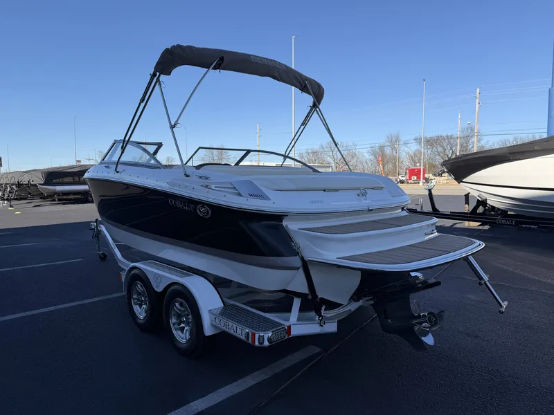 Slide: The Image of 2008 Cobalt 202 boat parked on trailer outdoors. - 6