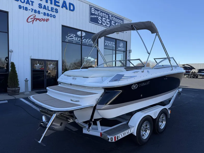 Slide: The Image of 2008 Cobalt 202 boat parked outside a sales shop. - 8