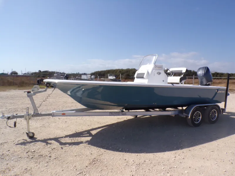 Slide: The Image of 2026 Tidewater 2110BMT boat on trailer, side view. - 3