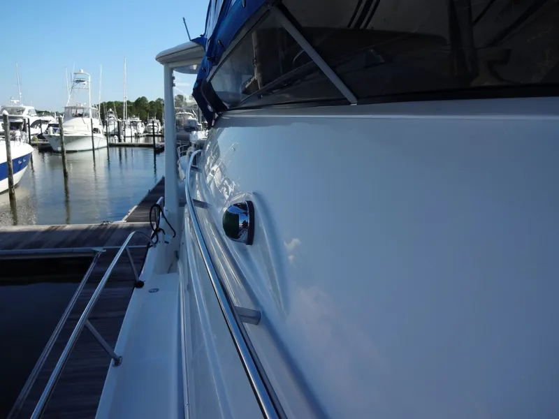 Slide: The Image of Side view of a 2007 Meridian 459 Motoryacht at the dock. - 27