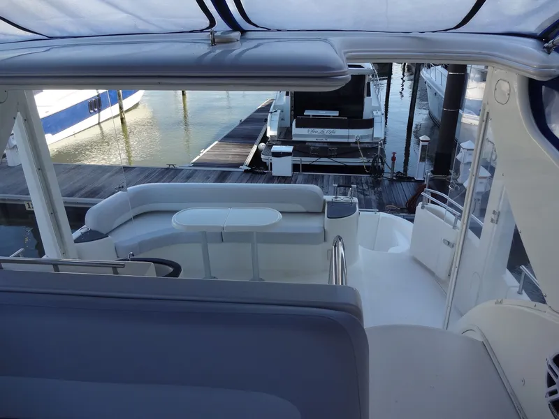 Slide: The Image of 2007 Meridian 459 Motoryacht with spacious deck area in harbor. - 49