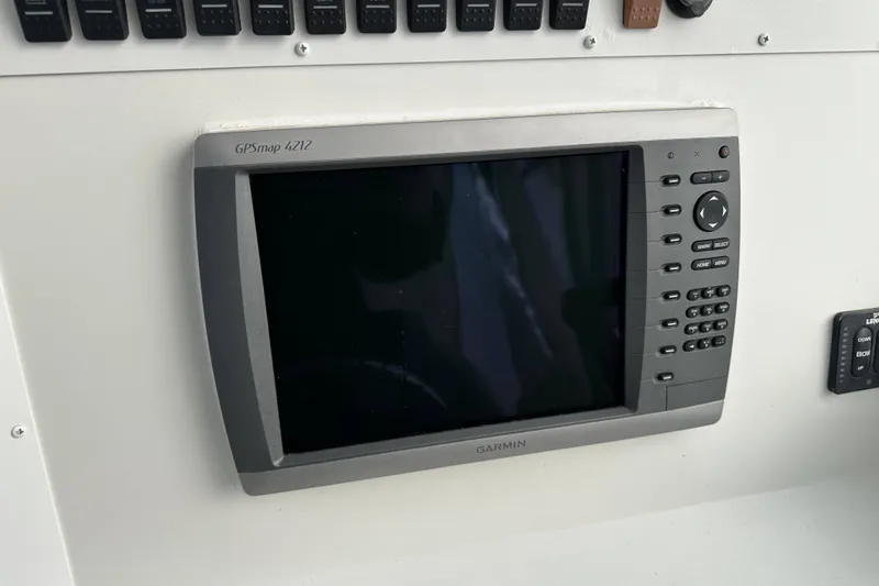 Slide: The Image of Garmin GPSmap 4212 on 2007 Polar 2300 Walkaround boat dashboard. - 14