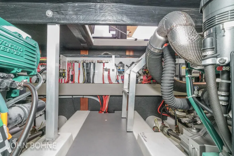 Slide: The Image of Engine room of 2018 Beneteau Swift Trawler 44 with Volvo Penta components. - 100