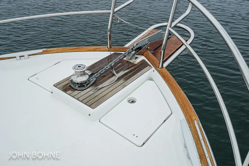 Slide: The Image of Bow of 2018 Beneteau Swift Trawler 44 with anchor and winch system. - 14