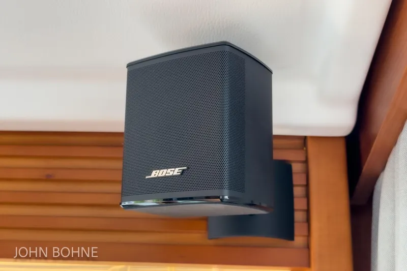 Slide: The Image of Bose speaker mounted on 2018 Beneteau Swift Trawler 44 interior wooden panel. - 55