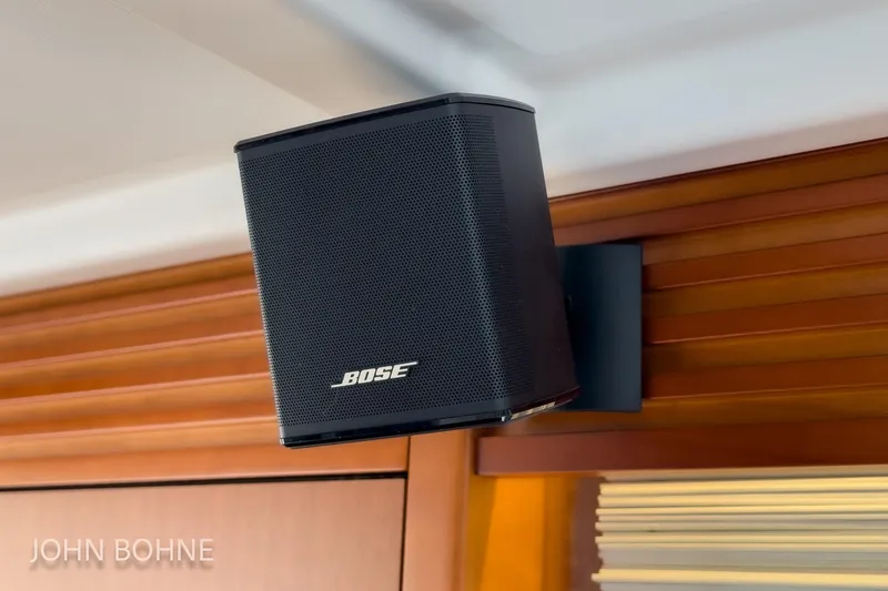Slide: The Image of Bose speaker mounted on 2018 Beneteau Swift Trawler 44's wooden interior. - 56