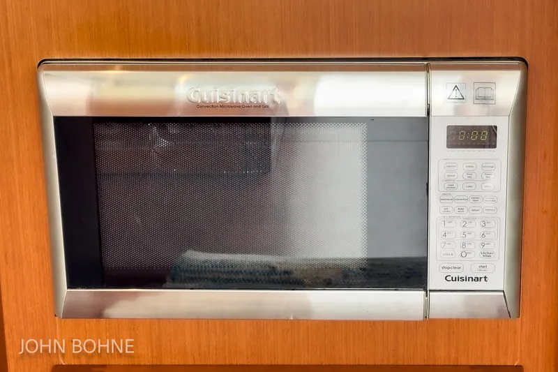 Slide: The Image of Cuisinart convection microwave oven in 2018 Beneteau Swift Trawler 44 kitchen. - 65