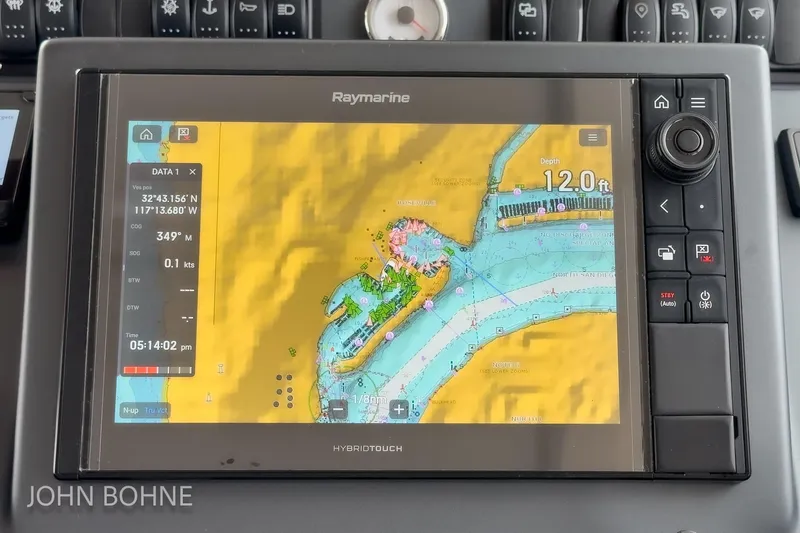 Slide: The Image of Raymarine navigation display on 2018 Beneteau Swift Trawler 44, showing nautical chart and coordinates. - 74