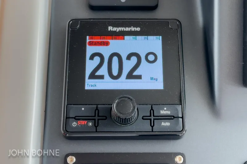 Slide: The Image of Raymarine display on 2018 Beneteau Swift Trawler 44 showing 202 degrees in standby mode. - 75