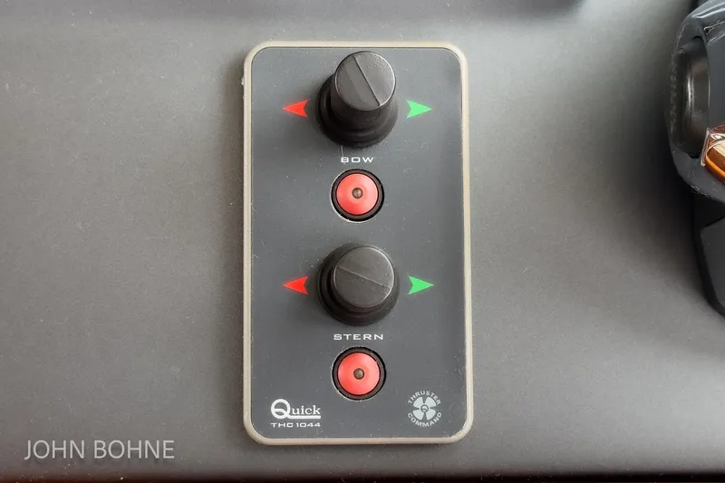 Slide: The Image of Control panel of a 2018 Beneteau Swift Trawler 44 with bow and stern thruster controls. - 77