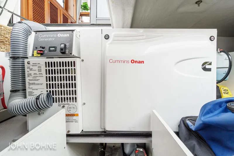Slide: The Image of Cummins Onan generator in 2018 Beneteau Swift Trawler 44 engine room. - 94
