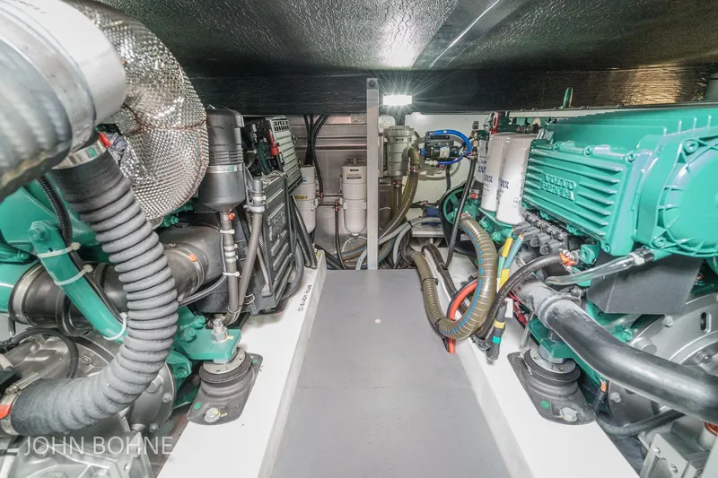 Slide: The Image of Engine room of 2018 Beneteau Swift Trawler 44 with Volvo Penta engines. - 97