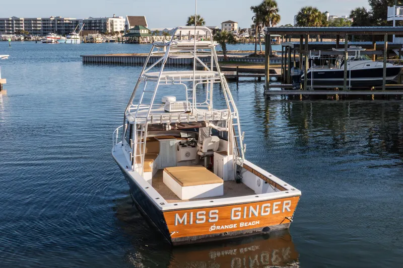 Slide: The Image of Island Hopper 30 boat "Miss Ginger" docked at Orange Beach marina, 2000 model. - 15