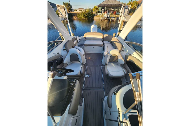 Slide: The Image of 2020 Crownline Eclipse E255 XS boat interior with luxurious seating and sleek design. - 10
