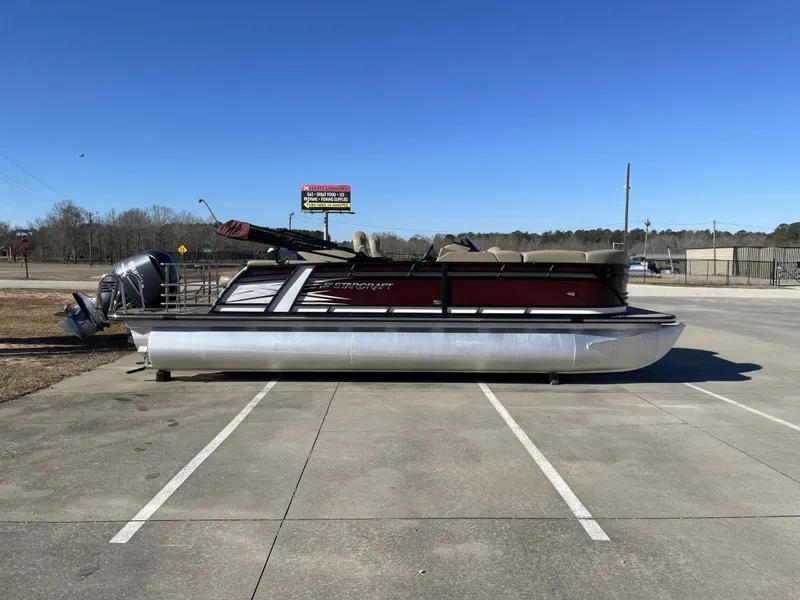 The Image of 2024 Starcraft SLS 3 Q DH pontoon boat in parking lot. - 1