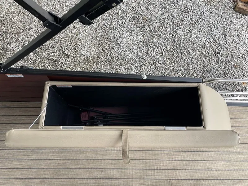 Slide: The Image of 2024 Starcraft SLS 3 Q DH storage compartment on boat. - 14