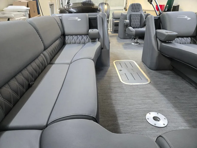 Slide: The Image of Interior of a 2022 Bennington 25RFB with gray upholstery. - 17