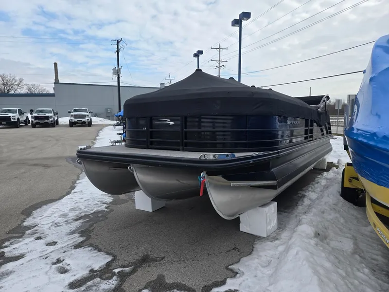 Slide: The Image of 2022 Bennington 25RFB pontoon boat on snowy parking lot. - 4