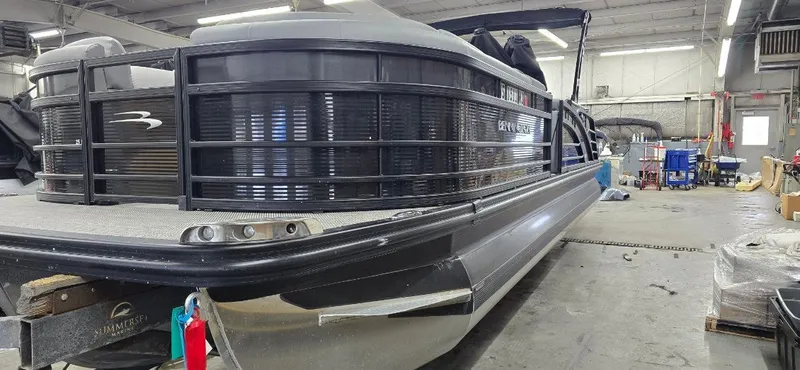 Slide: The Image of Bennington 25RFB 2022 pontoon boat in a workshop. - 7