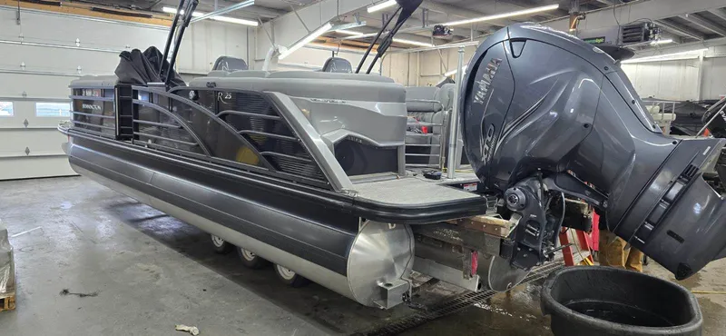Slide: The Image of Bennington 25RFB 2022 pontoon boat in a workshop. - 9