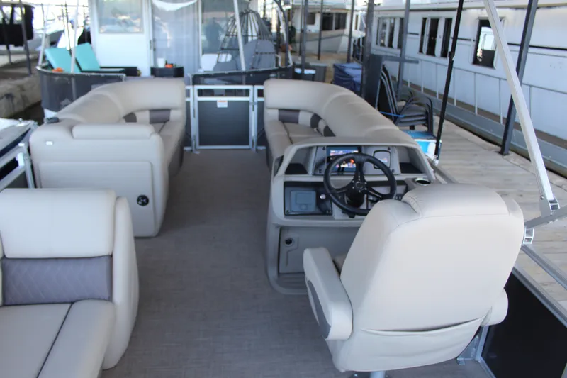 Slide: The Image of Interior of Tracker PB 20 DLX pontoon boat, model year 2025. - 15